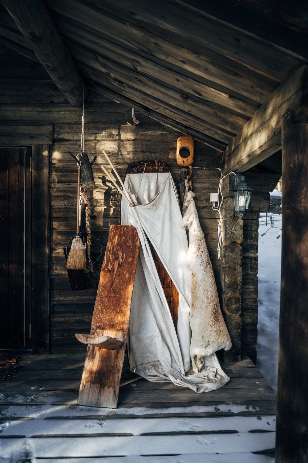 A white anorak hanging by the door of Biiga