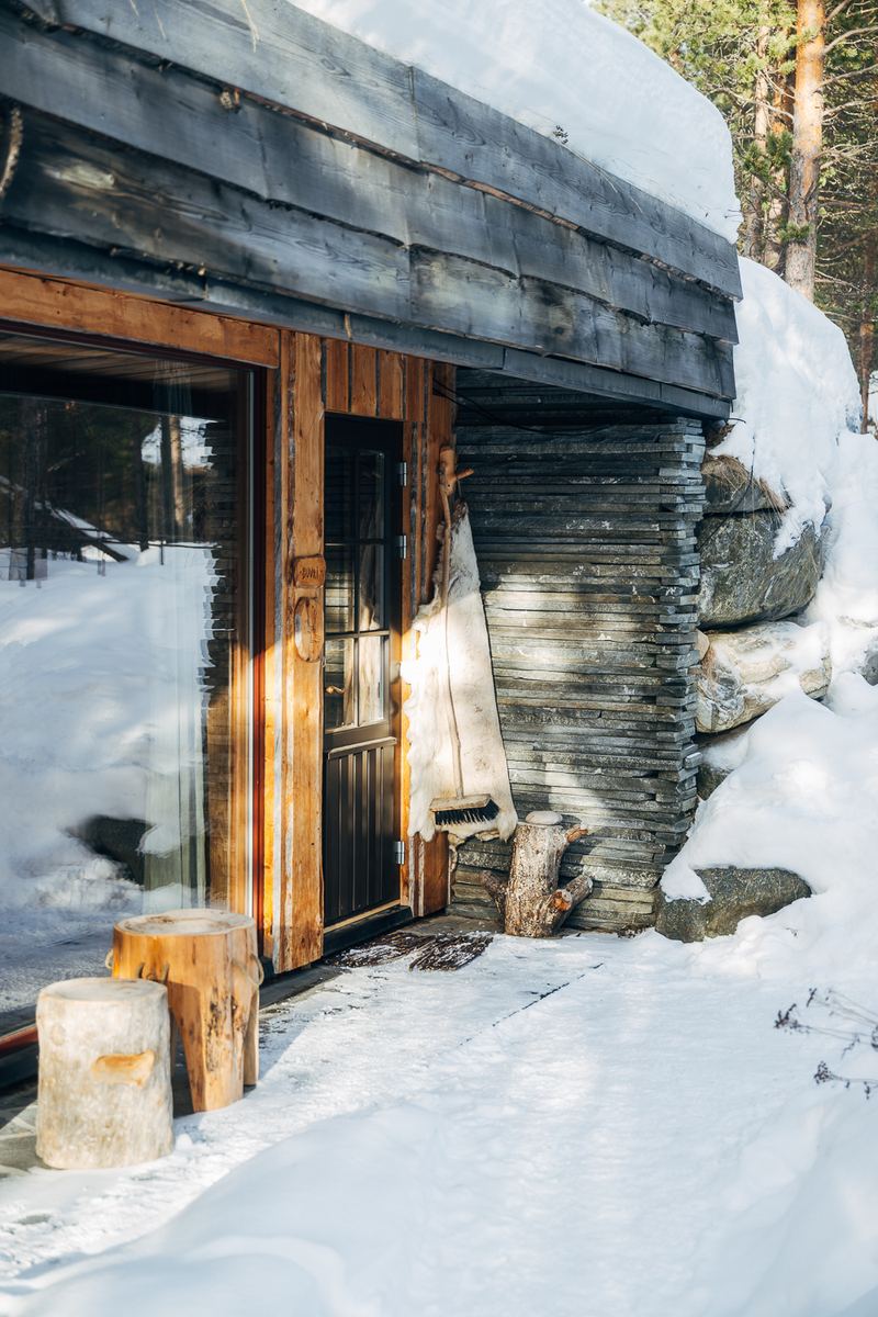 The door of Buvri banked with snow