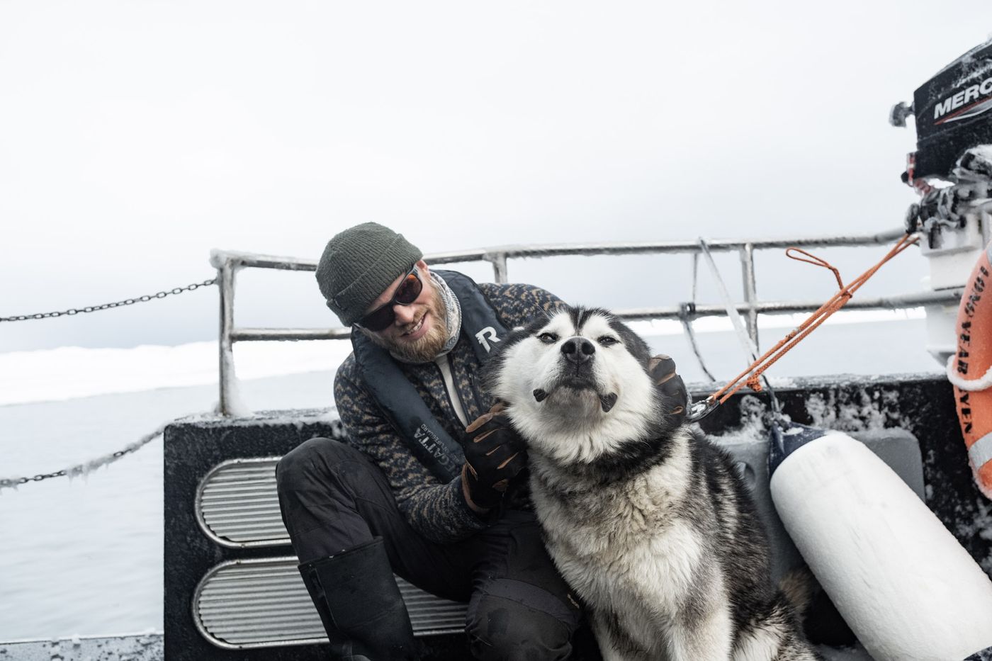 Captain and Bilbo on the boat