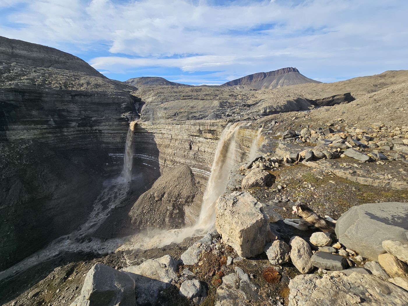 Waterfalls and small Bilbo behind the rocks