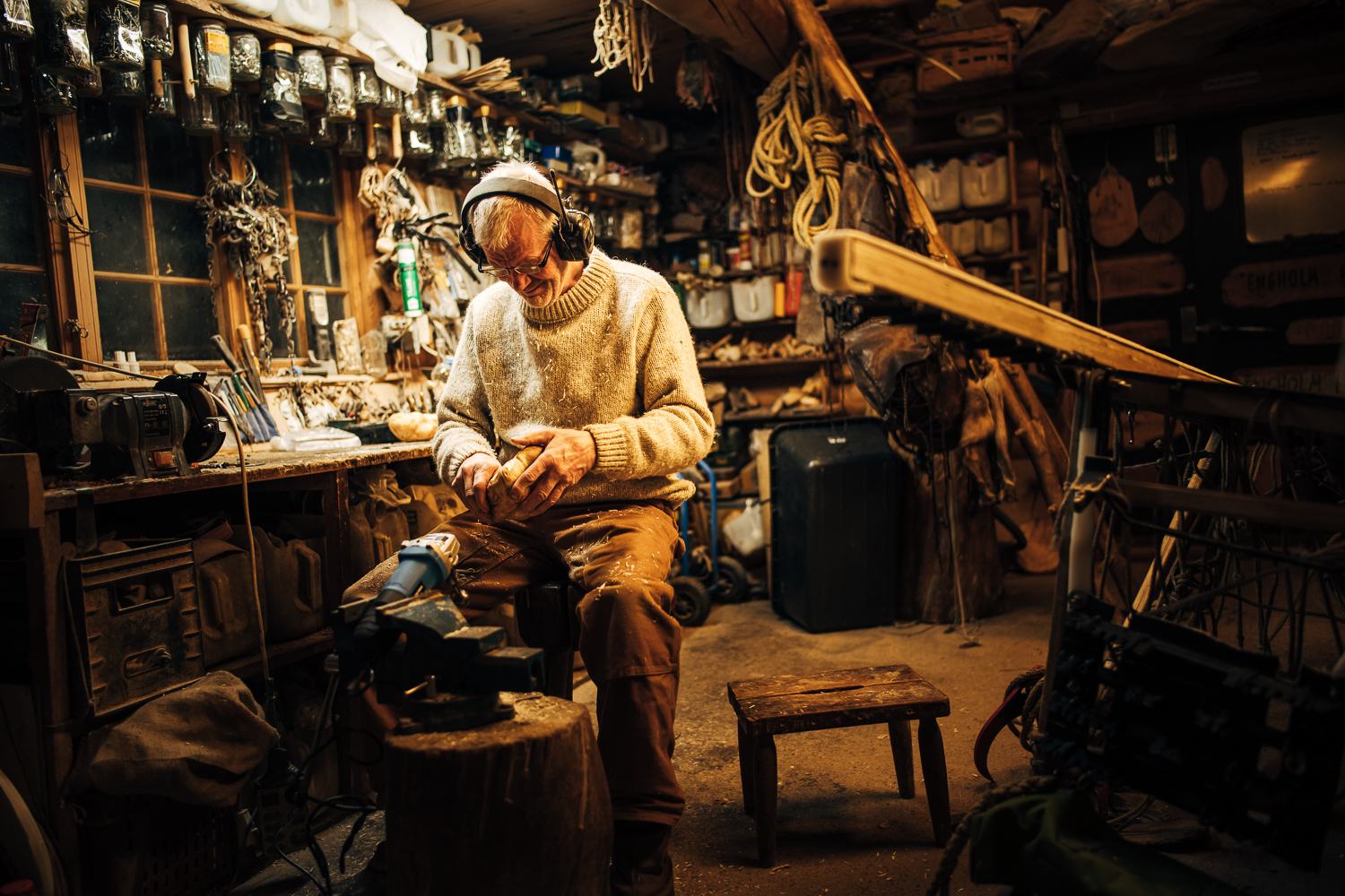 Sven at work among tools and harness in the workshop